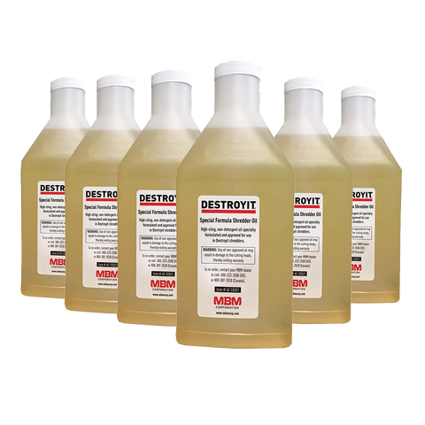 6 Bottles, 1 quart each of Specially Blended Oil for the Auto Oiler Shredders