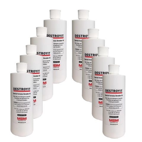 8 Bottles, 1 pint each of specially blended shredder oil